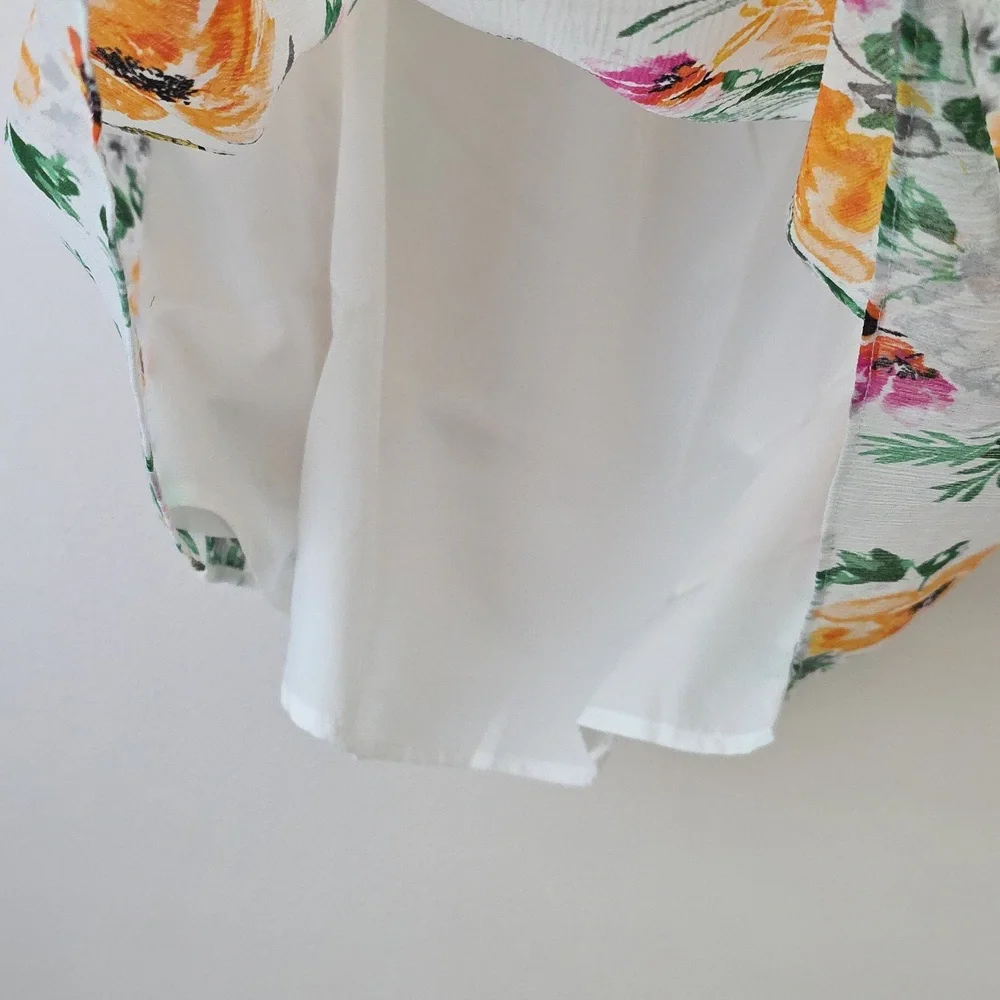 Torrid Floral with Orange and Green Accents